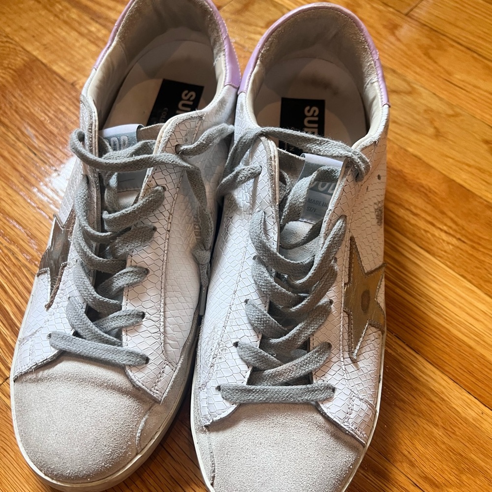Golden Goose Superstars. White snakeskin with silver leather star and lilac heel